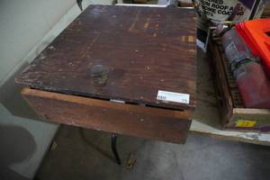 lot 75 image: Wood wall cabinet & tarp inside