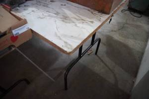 lot 80 image: White Formica roller  table 68 L x 32 W x 30 T