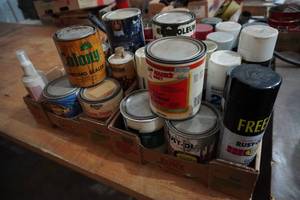 lot 89 image: Two boxes of spray paint and stain