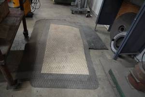 lot 98 image: Several shop rubber floor mats and rugs