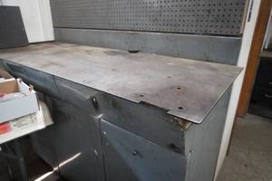 lot 111 image: Metal work bench, 3 drawers, old jacks, heat coils, dial indicator &amp micrometers