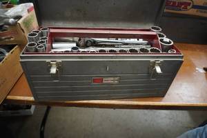 lot 119 image: Craftsman tool box with 12 sockets  and rachet