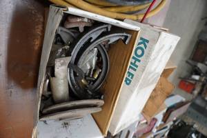 lot 122 image: Misc Model T brake parts, Kohler starter