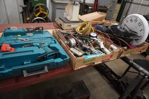 lot 146 image: Two scales, clock, air connectors, Makita drill, set of key cutters and reamers